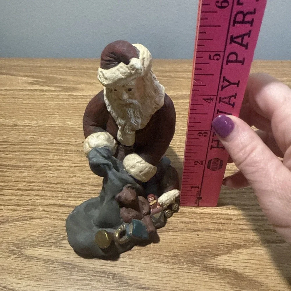 Santa Figurine Pulling‎ Toys Out Of A Sack